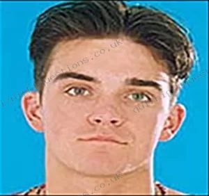 Robbie Williams picture quiz clue